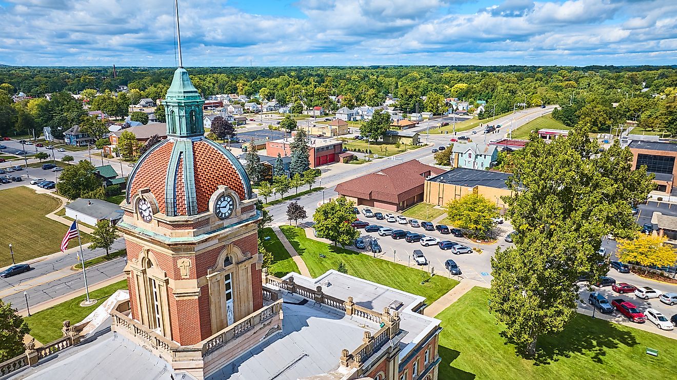 Aerial view of the Elkhart County Courthouse surrounded by a suburban townscape. 