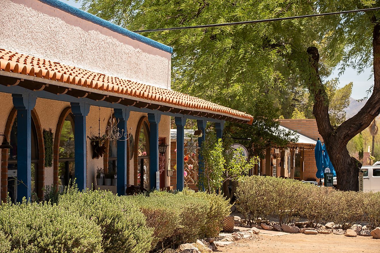 Editorial Photo Credit: Matt Gush via Shutterstock. Tubac, Arizona, USA - May 29, 2022: Afternoon sunlight shines on the downtown art galleries and stores of historic Tubac.