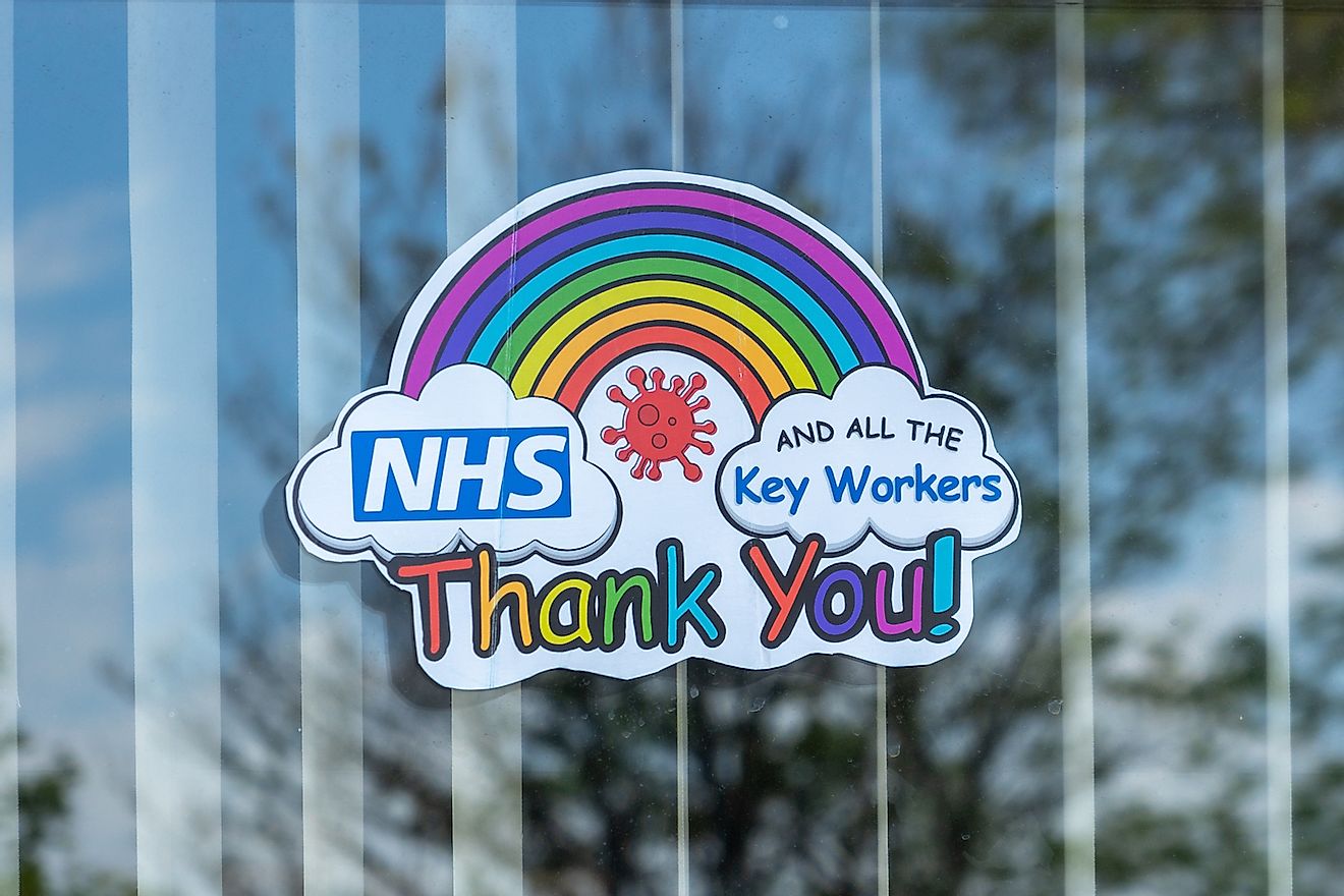 A rainbow in a house window to thank the NHS and key workers during the Coronavirus or Covid-19 Isolation. Image credit: Gary L Hider/Shutterstock.com