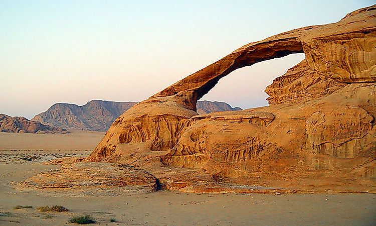  A natural arch produced by erosion of differentially weathered rock in Jordan.