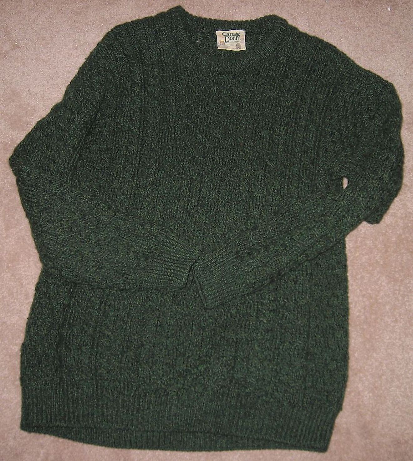 Aran Sweater, green, made by "Carraig Donn", Ireland. Image credit: User:Smee/Public domain