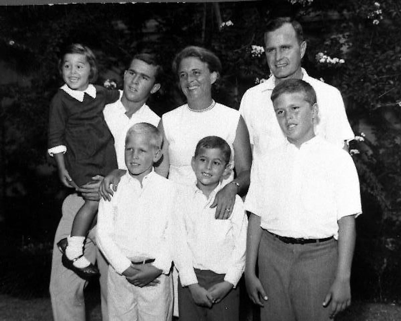 Bush, top right, stood with his wife and children, mid 1960s. Image credit: Quadell/Public domain