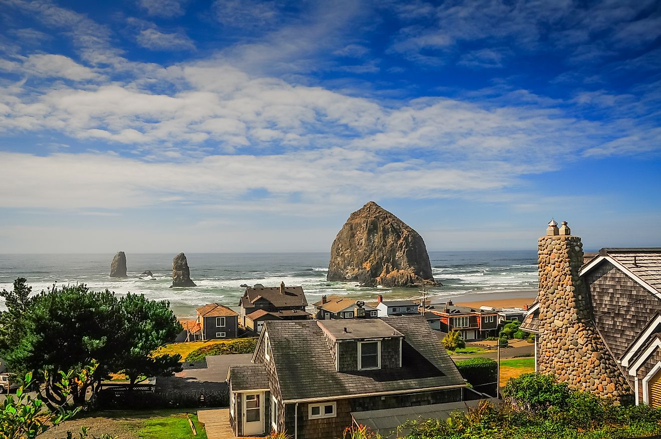 Haystack Rock and beachside homes in Cannon Beach, Oregon.