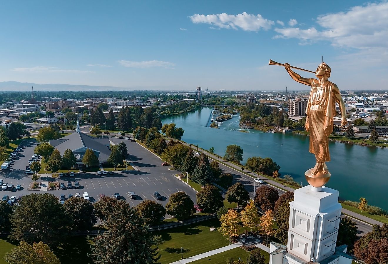 Aerial view of the waterfall in the city of Idaho Falls, Idaho, with a temple in the city center. Image credit RAW-films via Shutterstock