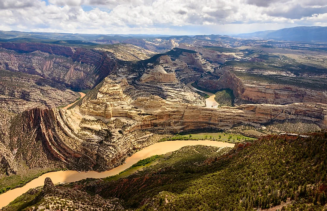 Dinosaur National Monument protects 80 acres of fossil embedded cliffs.