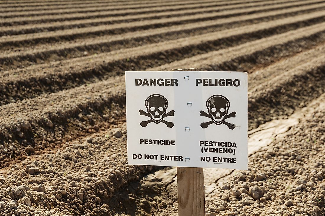 A sign warning of the dangers of pesticides. 