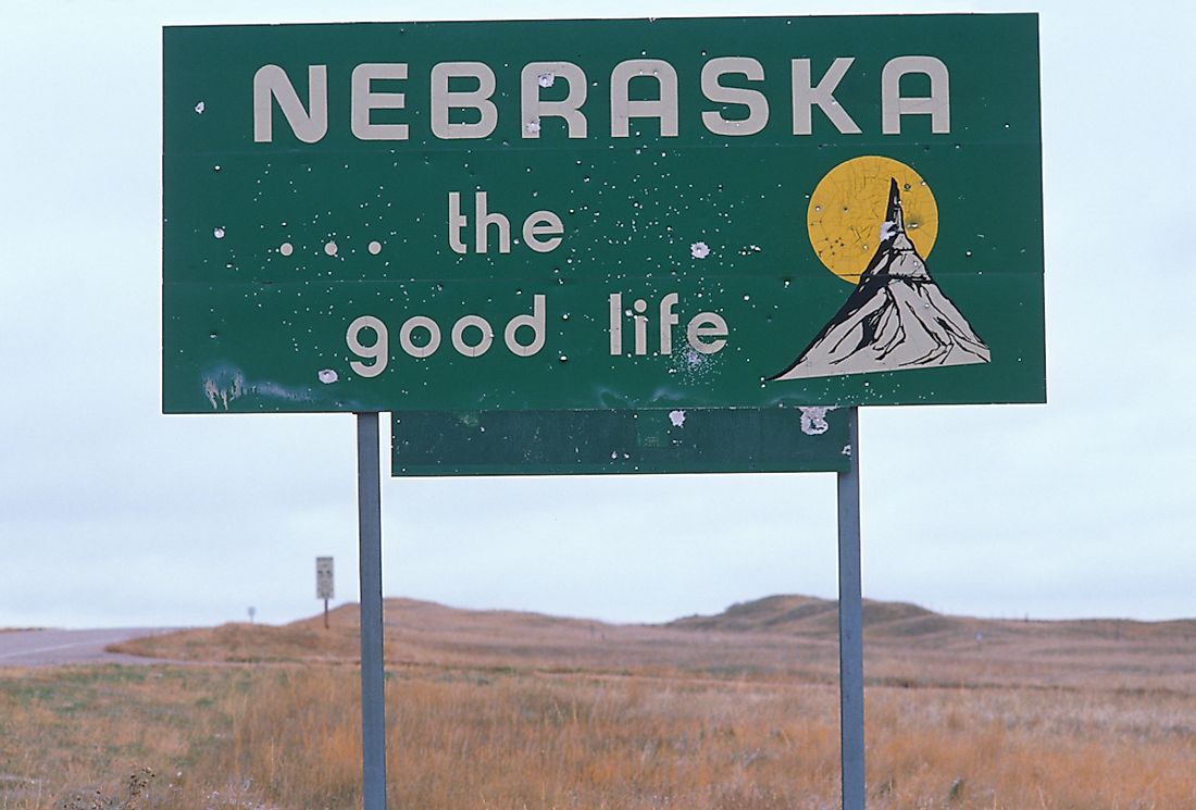 A state sign welcoming visitors to Nebraska. 