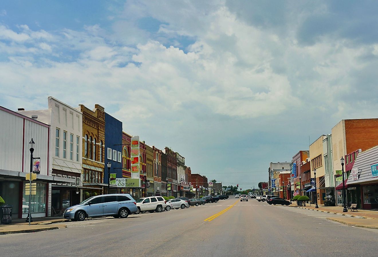 Old buildlings and cars parked on the curb side at the main street of Denison, Texas, Editorial credit: RaksyBH / Shutterstock.com