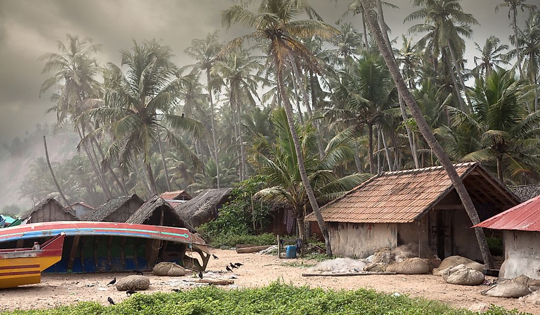 Monsoon storm descending over a fishing village in Varkala, Kerala, India.