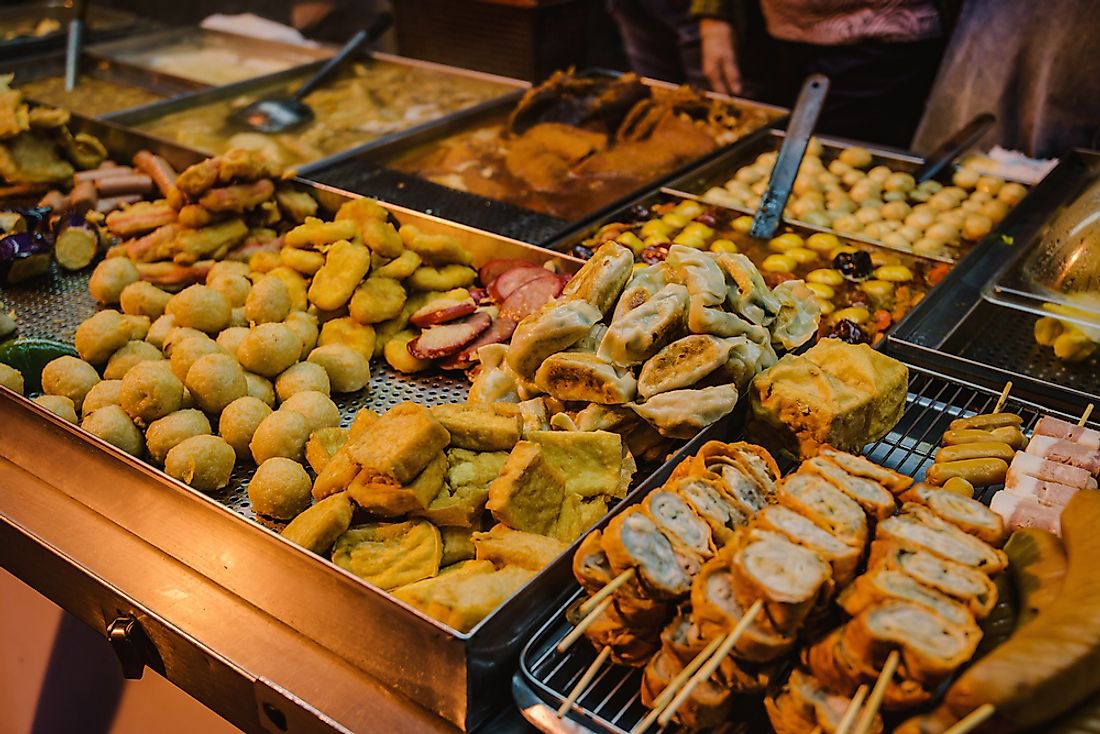 Street food offerings in a Hong Kong night market. 
