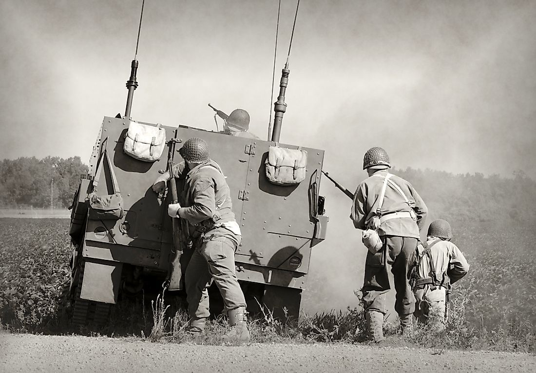Soldiers in a WWII era battle. 