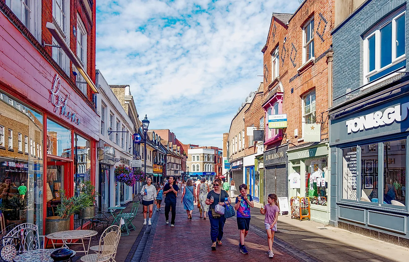 Tourists stroll through the pedestrian shopping streets of Windsor, England. Image credit: Darryl Brooks / Shutterstock.com.
