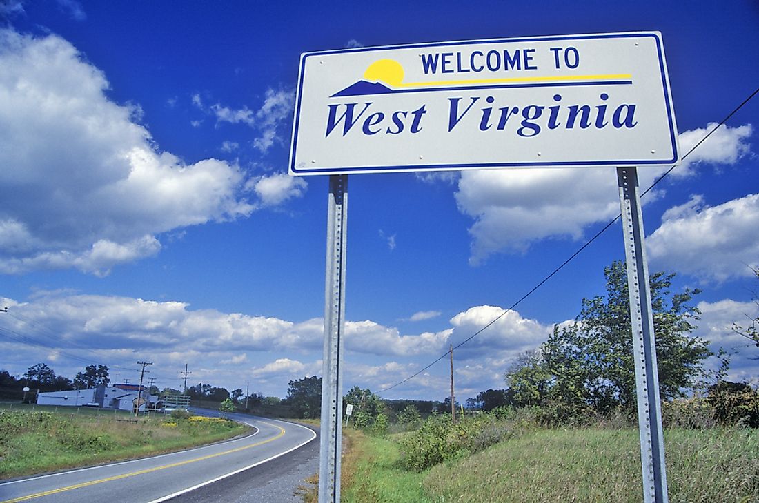 A sign differentiating between Virginia and West Virginia. 