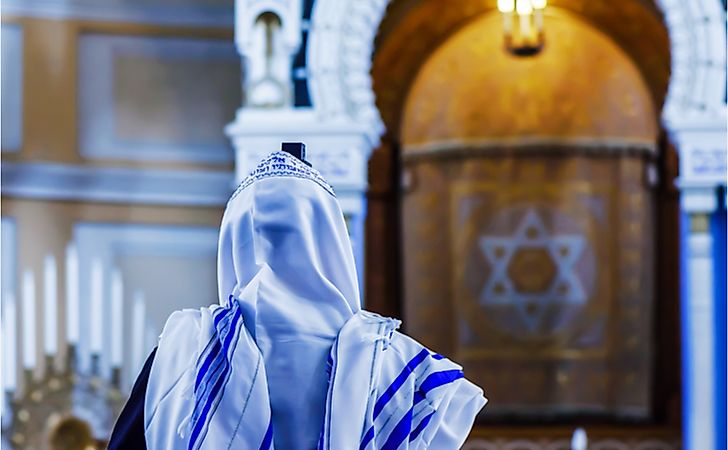 A Jewish man prays in the synagogue.