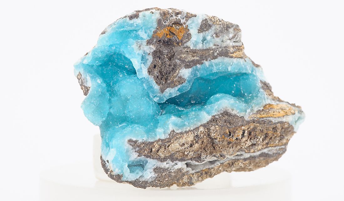 Bright blue hemimorphite mineral in a rock vug.