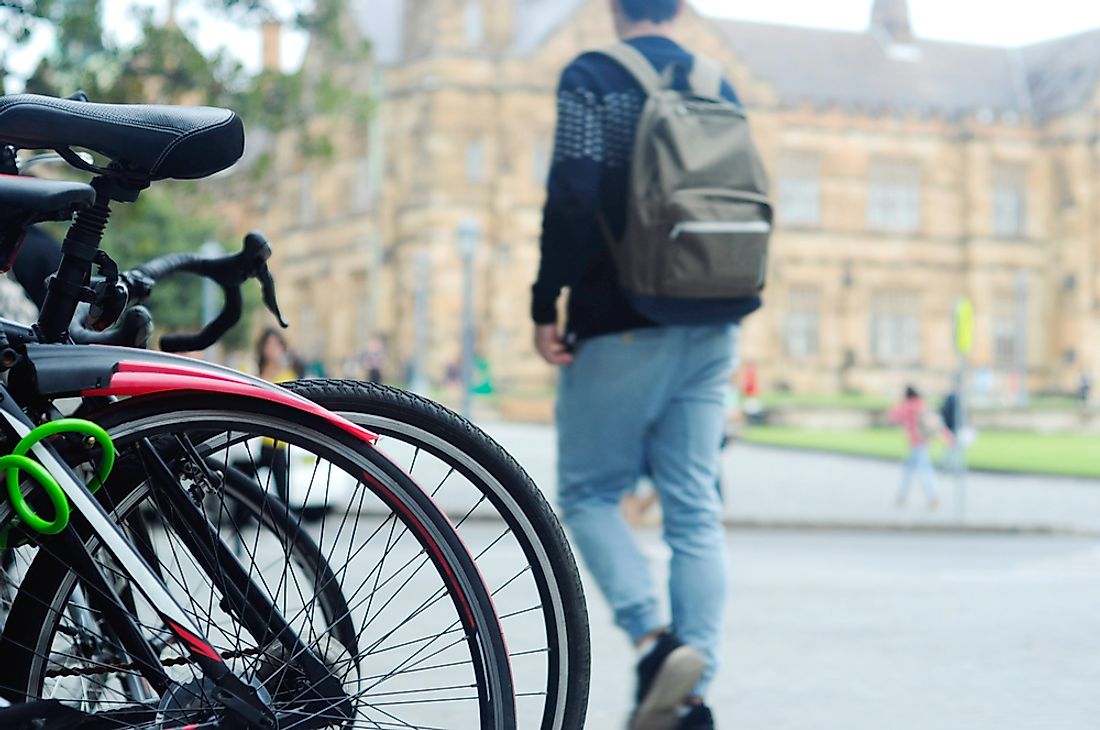 A student walking at the University of Sydney. 