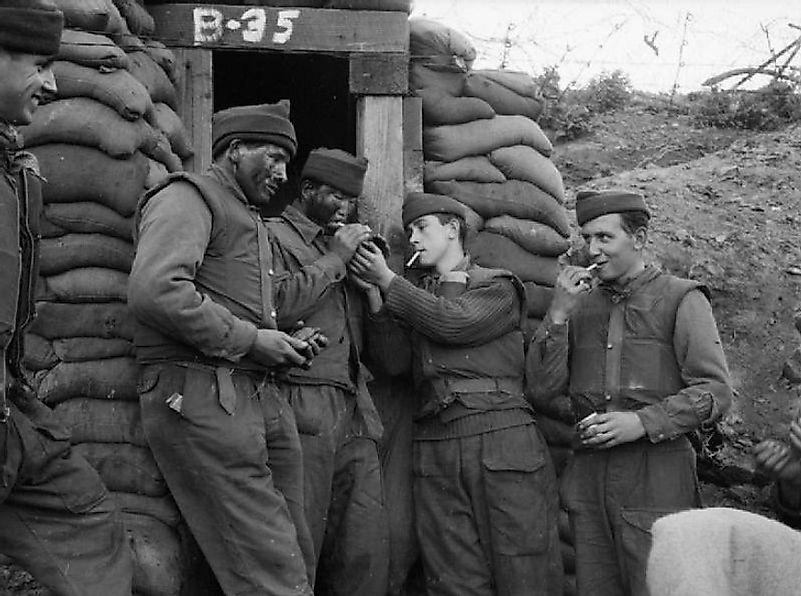 Fellow British "Dukes" share some quality time with a few cigarettes before heading out onto patrol around 'the Hook' near Kaesong.