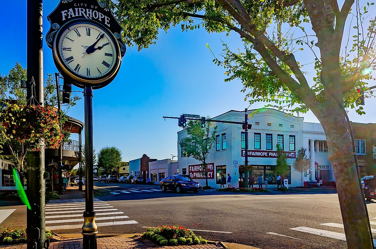 A street clock stands on Section Street in downtown Fairhope, Alabama. Image credit: Carmen K. Sisson / Shutterstock.com.