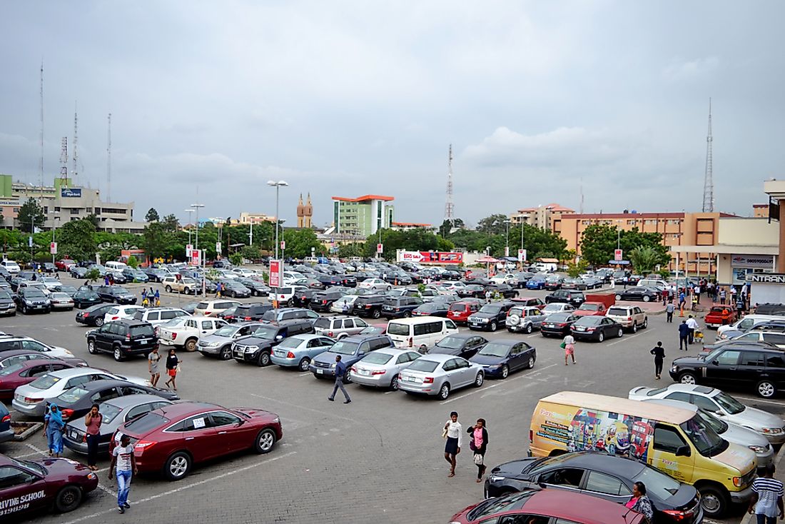 A full parking lot at Ikeja City Mall, one of the largest shopping malls in Nigeria. Editorial credit: Omnivisuals / Shutterstock.com. 