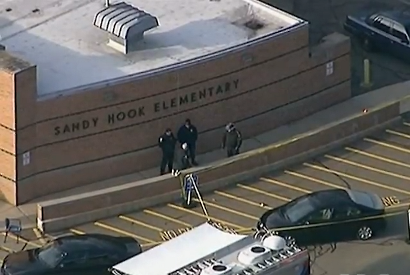 Police arrive at Sandy Hook Elementary, after the shooting on December 14, 2012. Image credit: VOA/Public domain