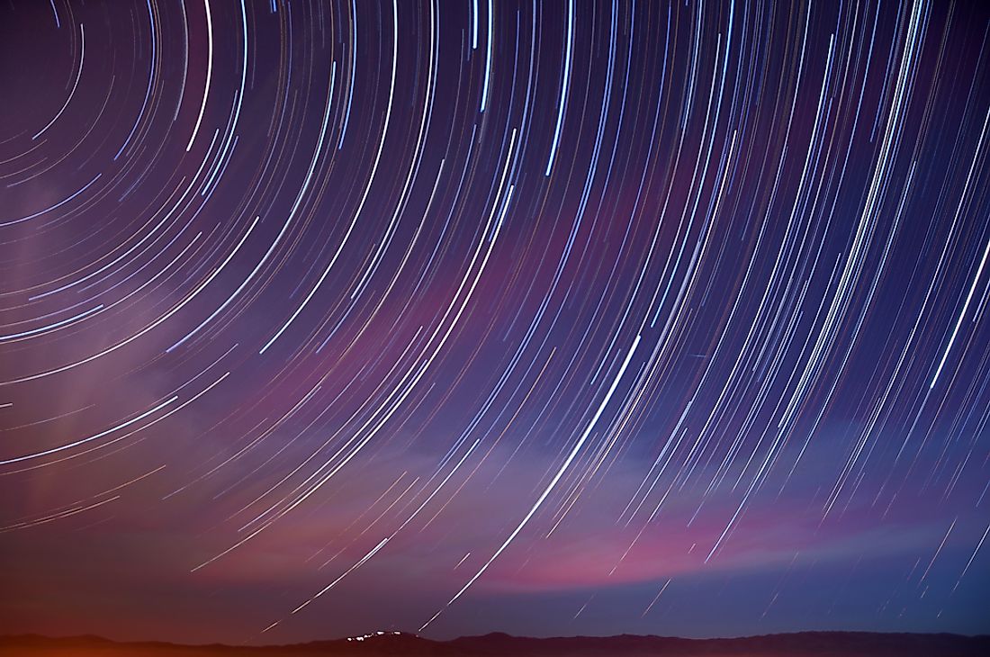 Star and auto trails with a Quadrantid Meteor above Mt. Hamilton in San Jose, California.
