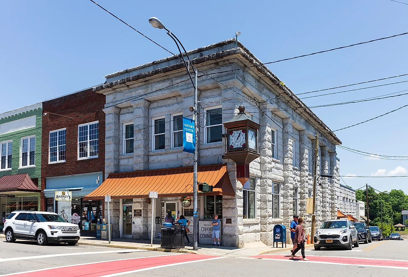 The Mount Airy Chamber of Commerce and Visitors' Center sets on Main Street, next to Barney's Café. People. Image credit Nolichuckyjake via Shutterstock.