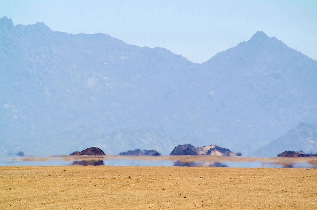 Mirages appear in arid environments like deserts. 