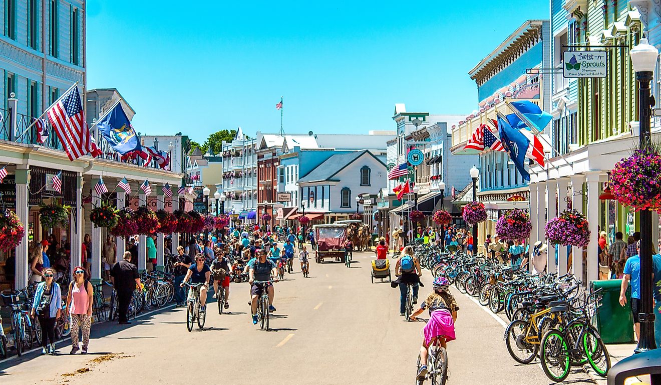 A busy day in downtown Mackinac Island, Michigan. Image credit: Michael Deemer via Shutterstock.com. 