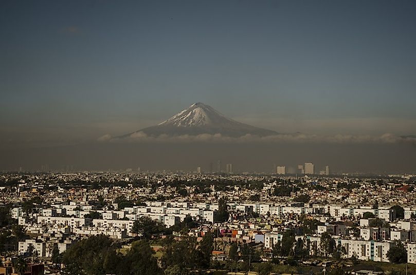 The volcanic Pico De Orizaba, as seen from the city of Orizaba below.