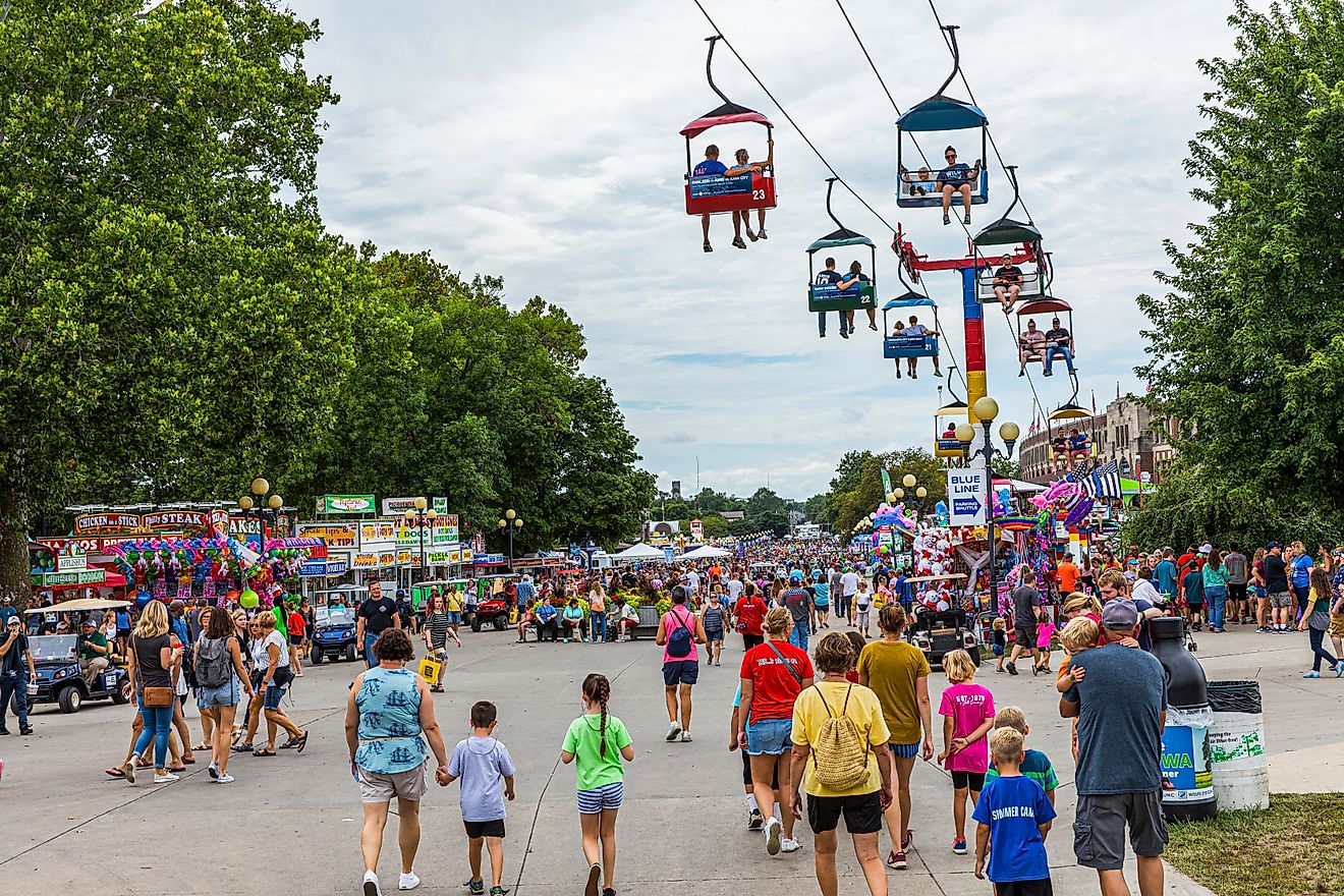People attend the Iowa State Fair in Des Moines, Iowa. Image credit: David Papazian / Shutterstock.com.