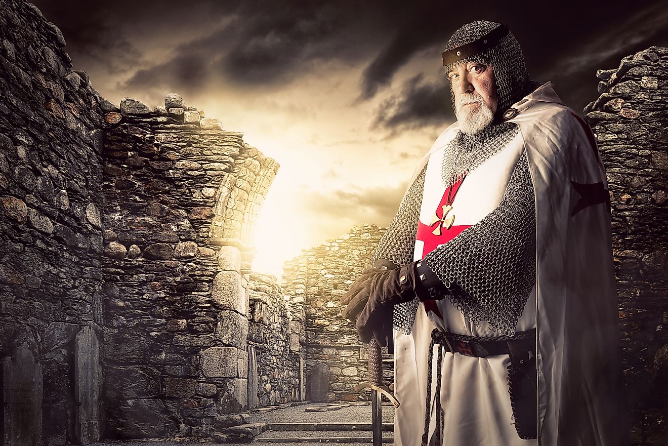 Knight Templar posing near some ruins. Image credit: Luis Louro/Shutterstock.com