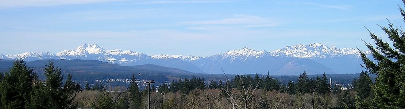 The Olympic Mountains stretch out across the horizon in the U.S. state of Washington.