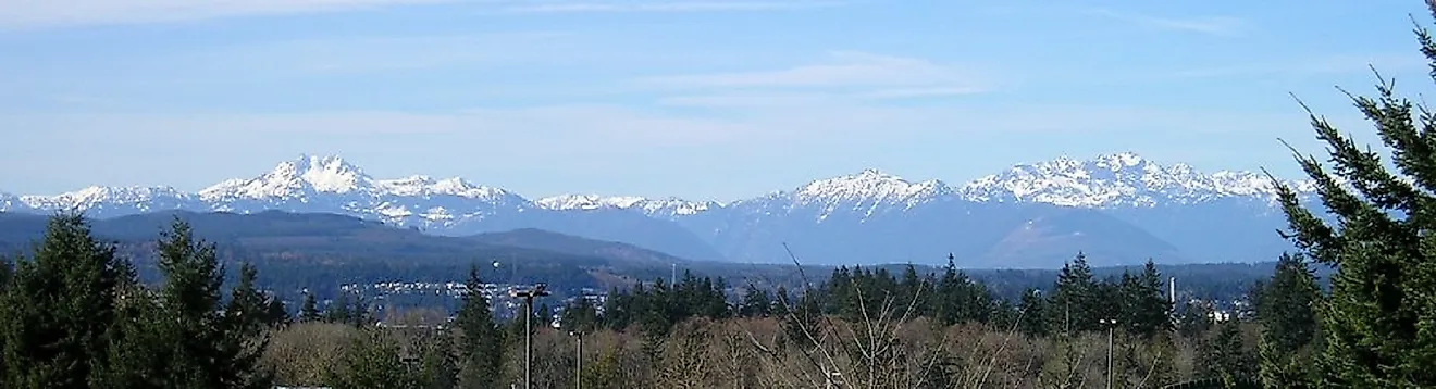 The Olympic Mountains stretch out across the horizon in the U.S. state of Washington.