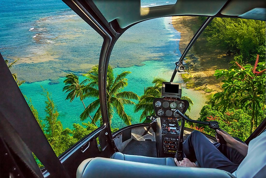 A helicopter flying over Kauai. 