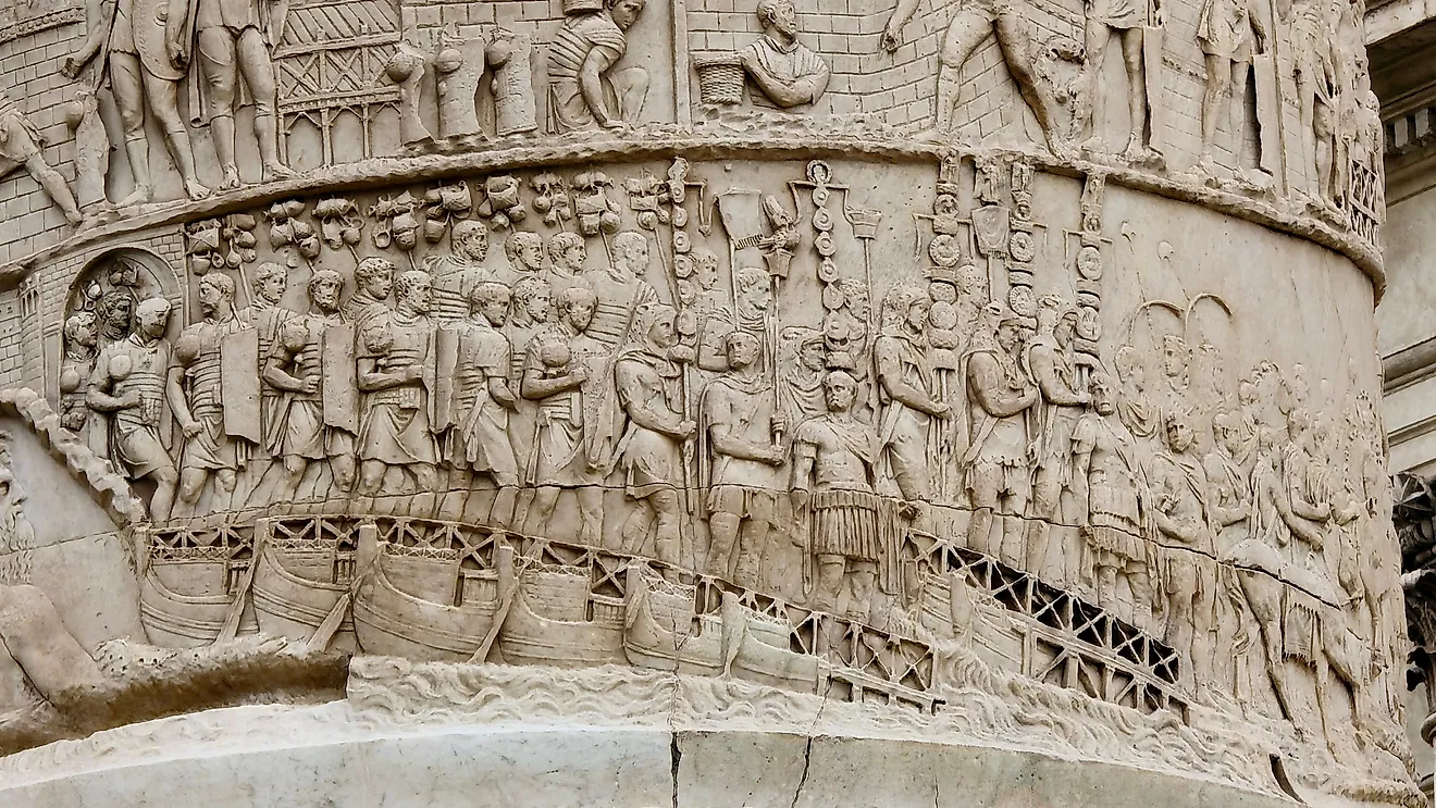 Detailed stone relief on Trajan's Column shows Roman soldiers during a military campaign. Image credit: History Skills / Shutterstock.com.