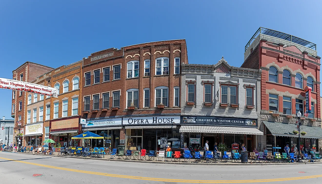 Buckhannon, West Virginia: The Historic Building along Main Street, with locals and tourist walking along, waiting for the parade