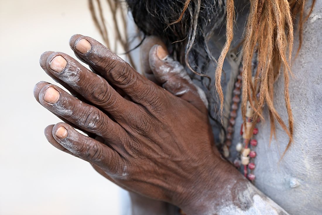 Hands of an Aghori baba. Editorial credit: Dietmar Temps / Shutterstock.com.