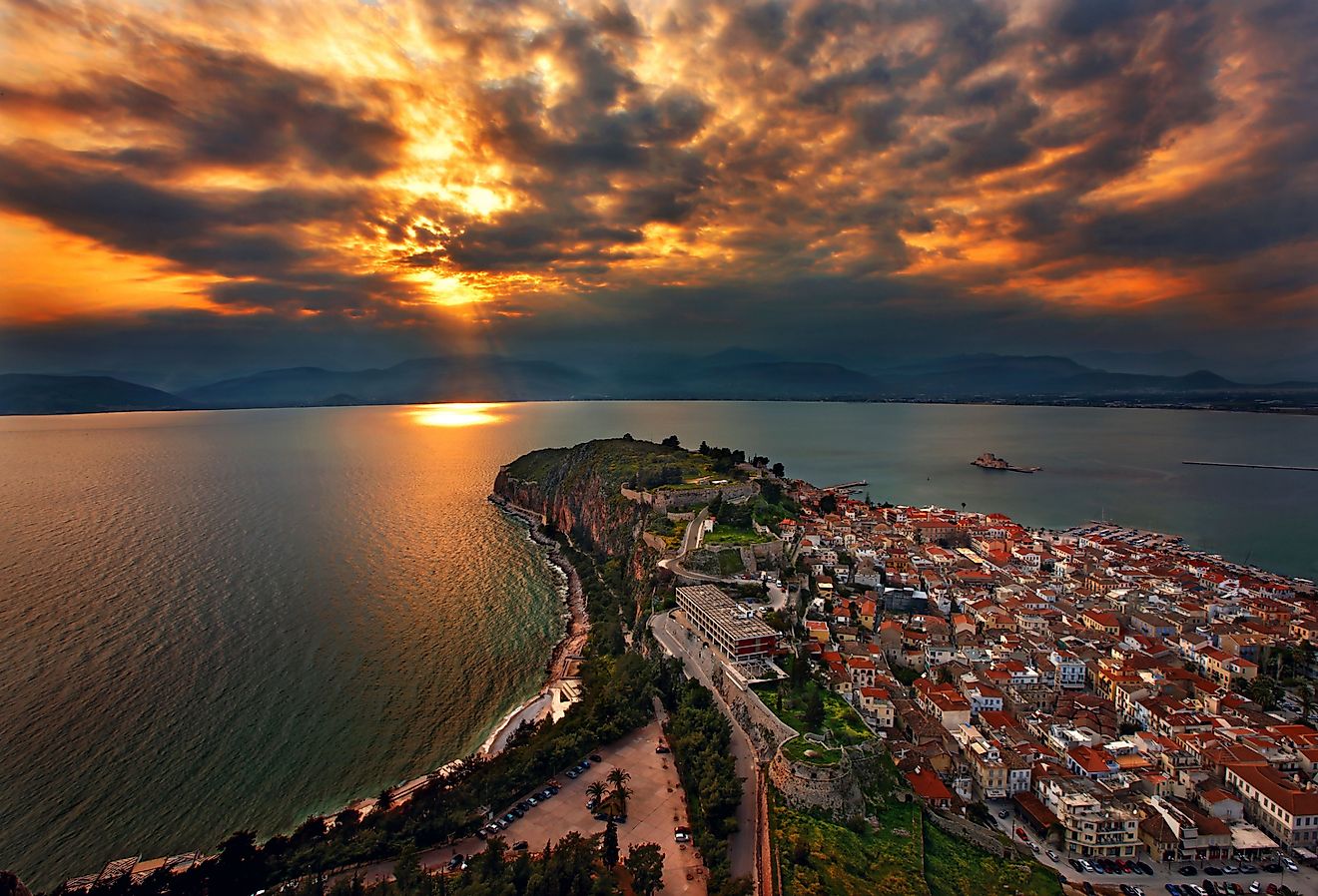 Panoramic view of Nafplio town and the Argolic gulf around sunset. Image credit Heracles Kritikos via Shutterstock. 