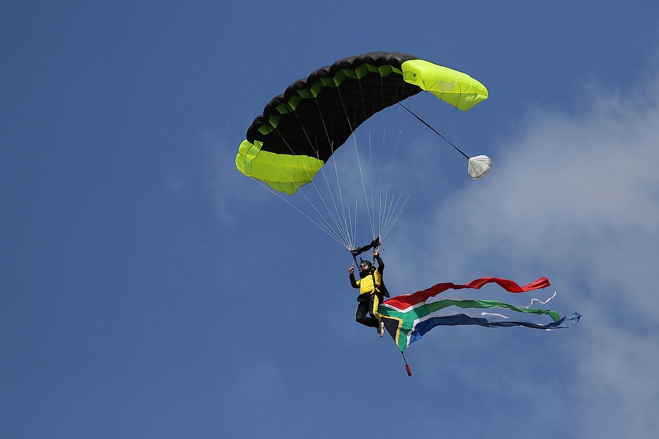 Sky diving is an adventurous activity that you can experience in South Africa. Image credit: Joggie Botma/Shutterstock.com