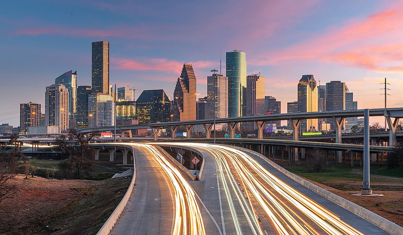 Houston, Texas, USA downtown skyline over the highways at dusk.