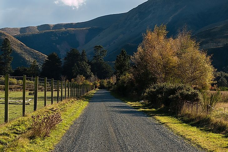 Farms and rolling fields where the Canterbury-Otago Tussock Grasslands meet the Southern Alps.