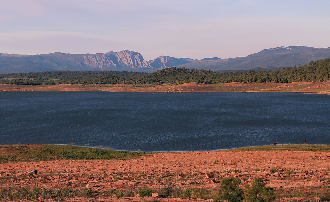 Late afternoon sun settling in over Lake Heron in New Mexico with views of the mountains in the distance. 