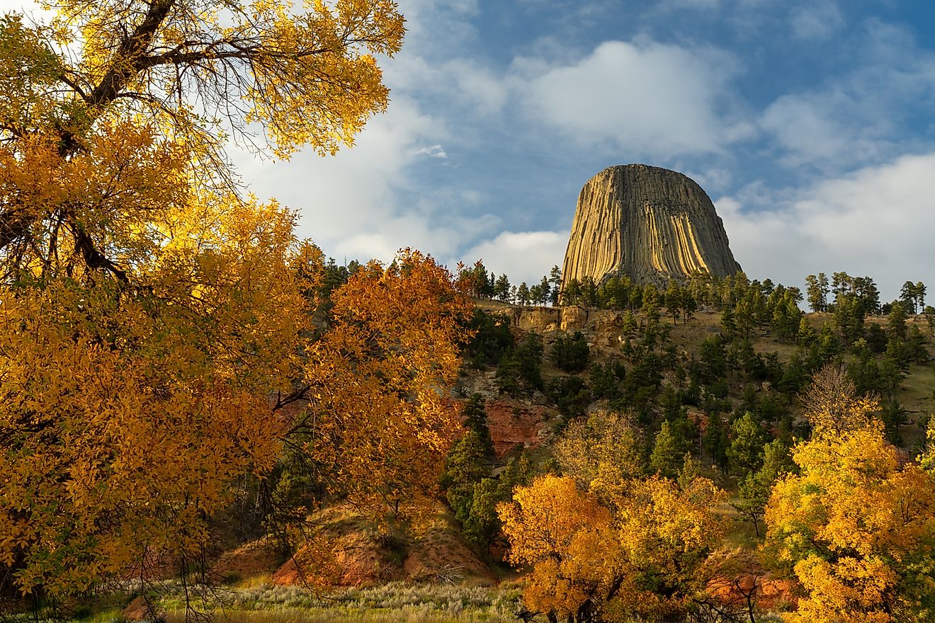 Fall Foliage frames the Devils Tower National Monument in Wyoming.