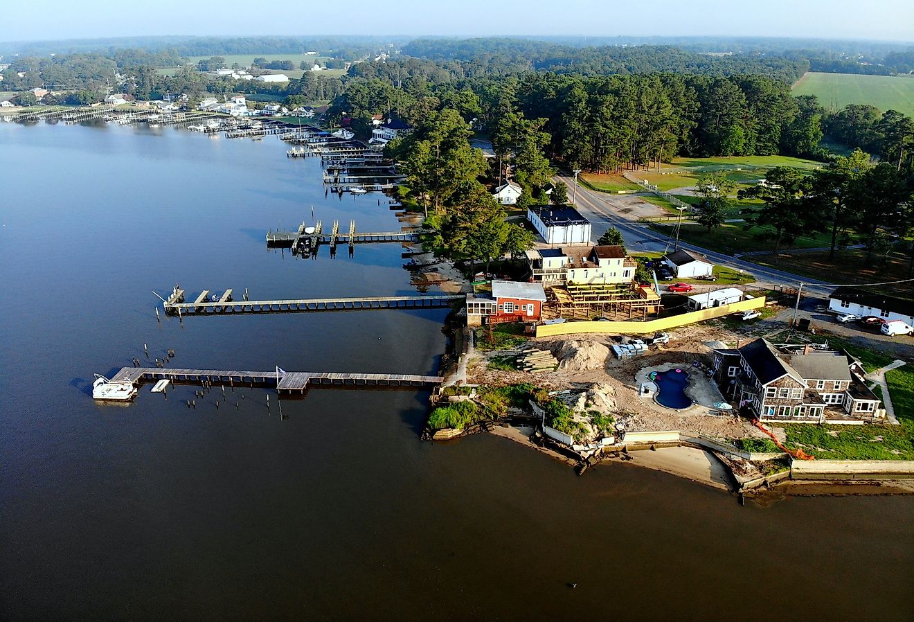 Aerial view of waterfront homes with a private dock near Millsboro, Delaware.