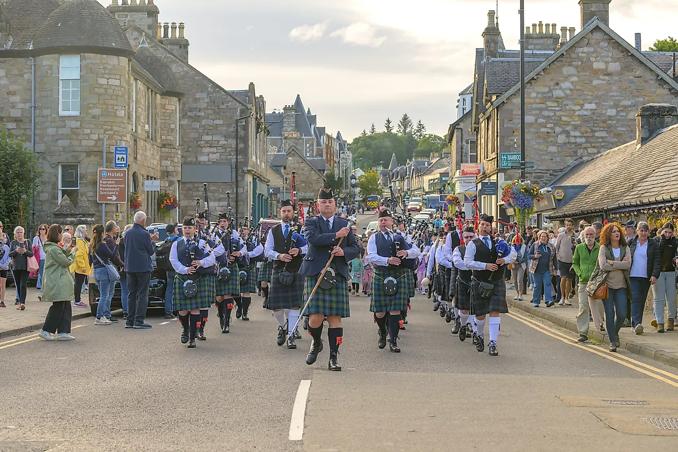 Pipe Band marching down Pitlochry High Street for the Highland Night. Image credit: Alan M. Walker / Shutterstock.com