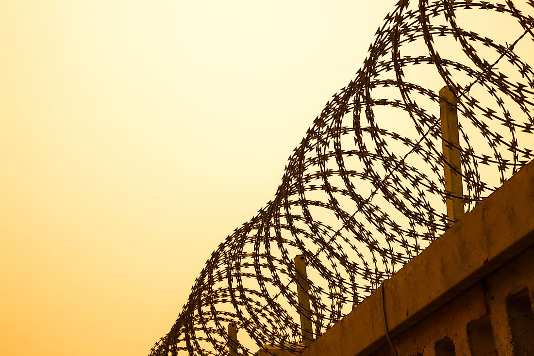 Some borders feature physical human-made barriers such as barbed wire fences. 