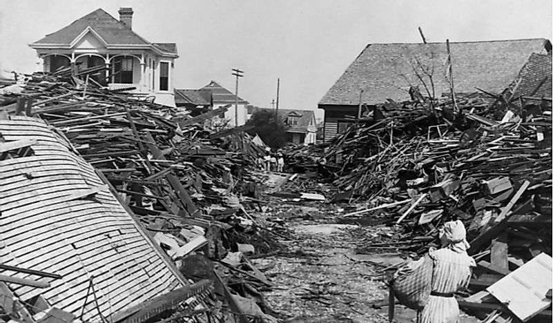 A woman examines the debris left behind in the destructive Galveston Hurricane of 1900. Editorial credit: Everett Historical / Shutterstock.com.
