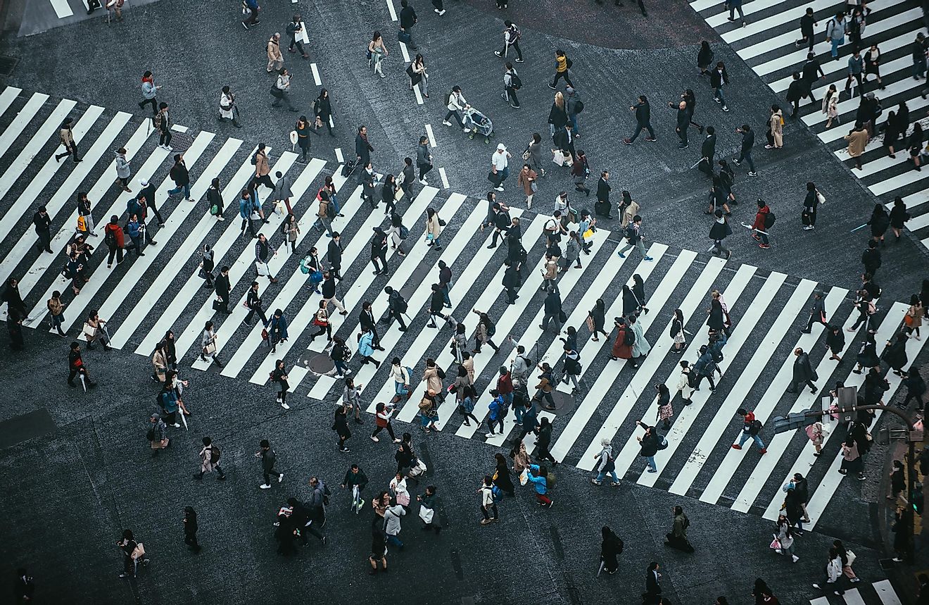 People crossing the street in Tokyo. Image credit: oneinchpunch/Shutterstock