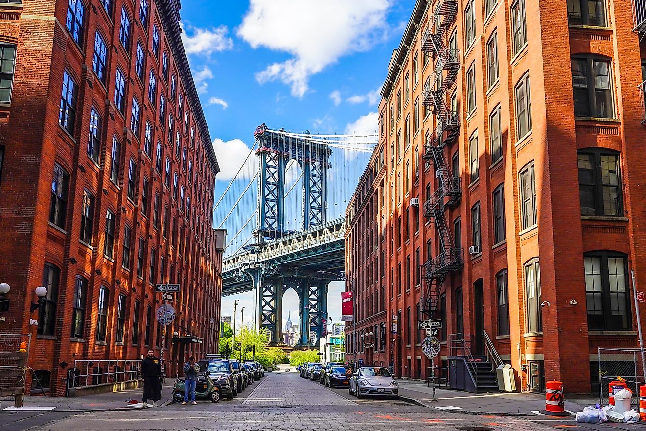 Iconic Manhattan Bridge and Empire State Building view from Washington Street in Brooklyn, New York
