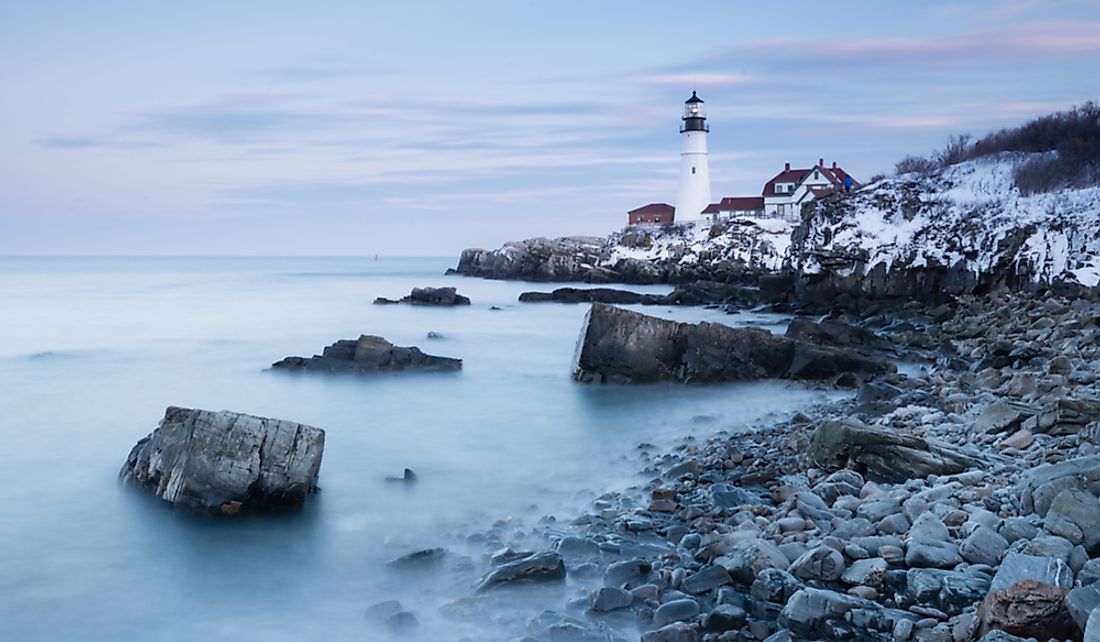 Portland Head Lighthouse along the rocky coastline of Maine. 